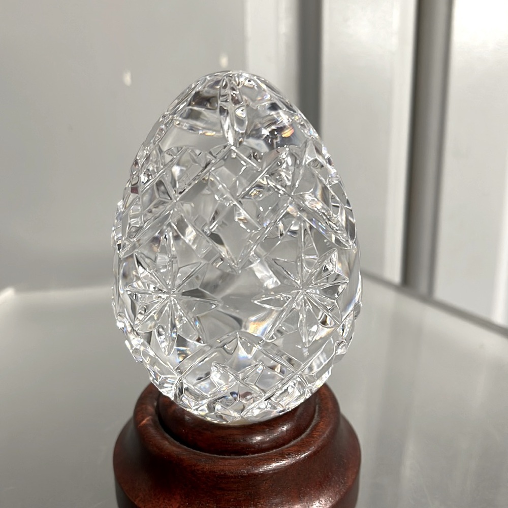 Waterford annual crystal egg with star impressions with wooden base